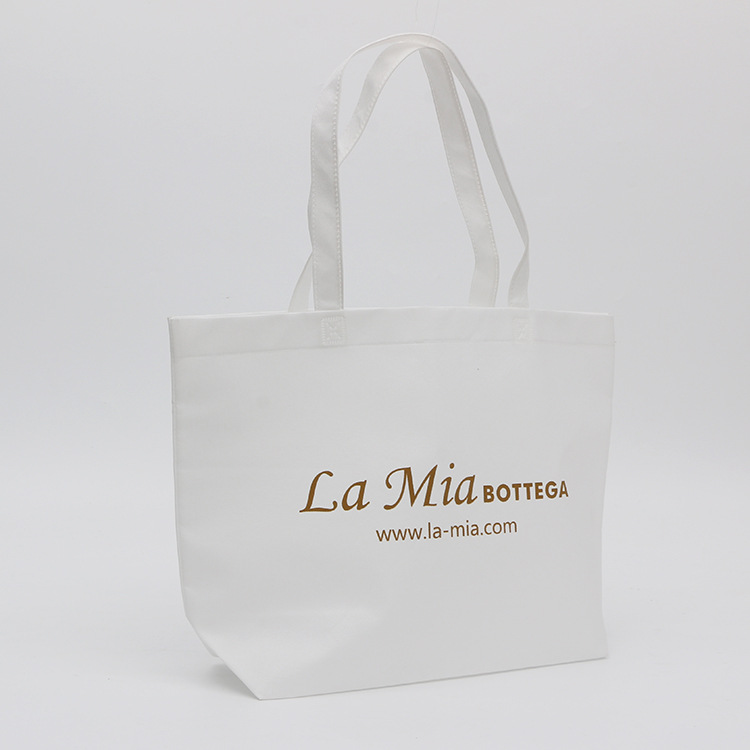 白色熱壓無紡布袋定制 印金色Logo打造高端廣告購(gòu)物手提袋